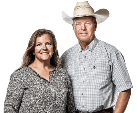 husband and wife smiling 