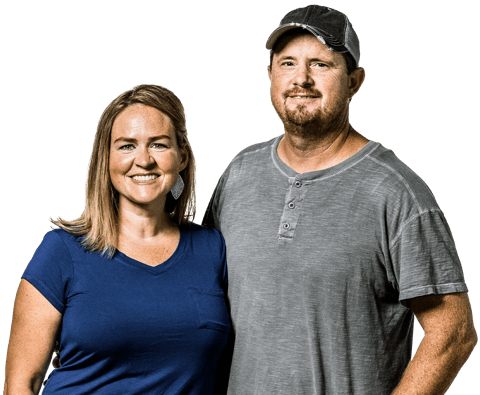 man and woman couple posing with smiles