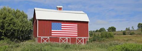 barn with American flag painted on the side